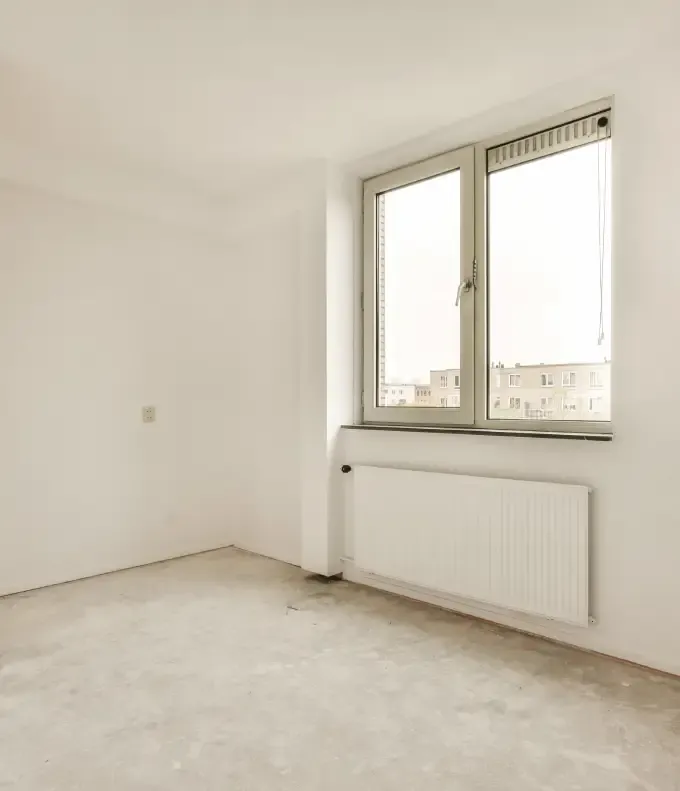 Besenrein übergebenes, leeres Zimmer nach der Wohnungsauflösung